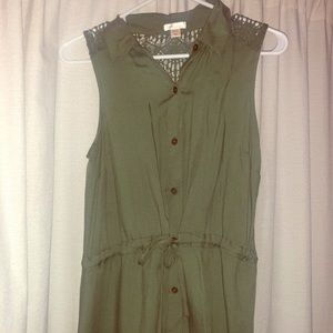 Green button down tank top.